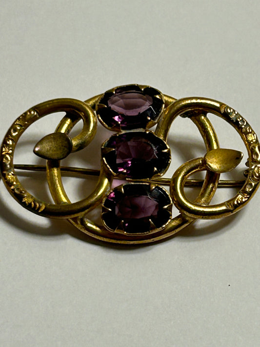 Antique Victorian purple stone brooch love knot