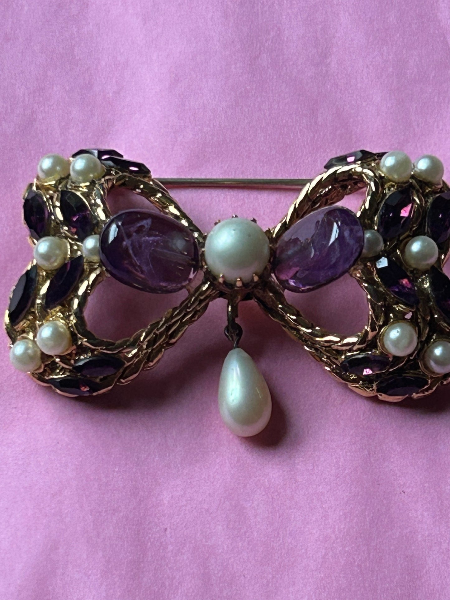 Pretty Vintage Brooch Signed Adrian Mann Bow with Amethyst Stones.