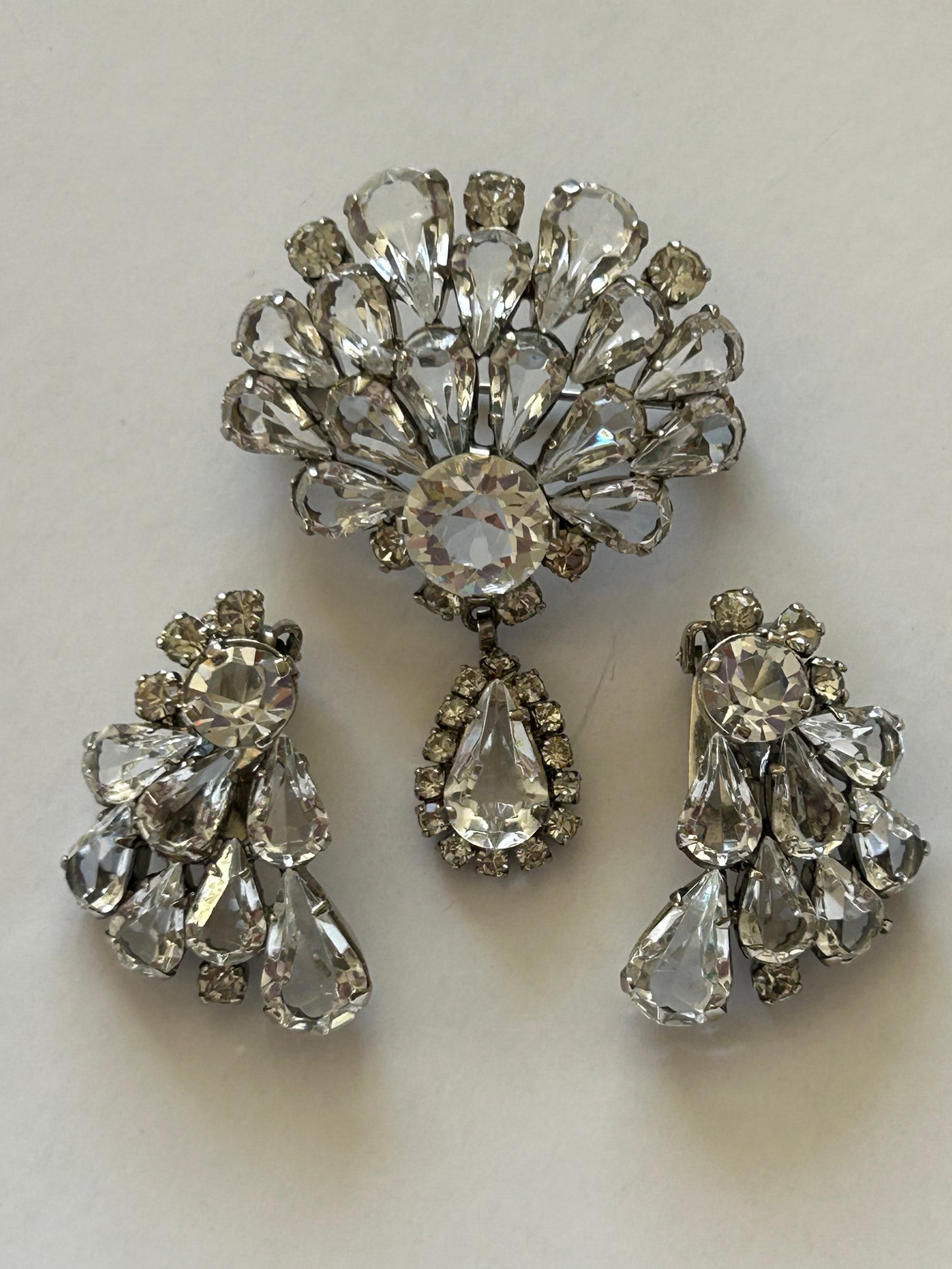 Vintage crystal set brooch and clip on earrings.