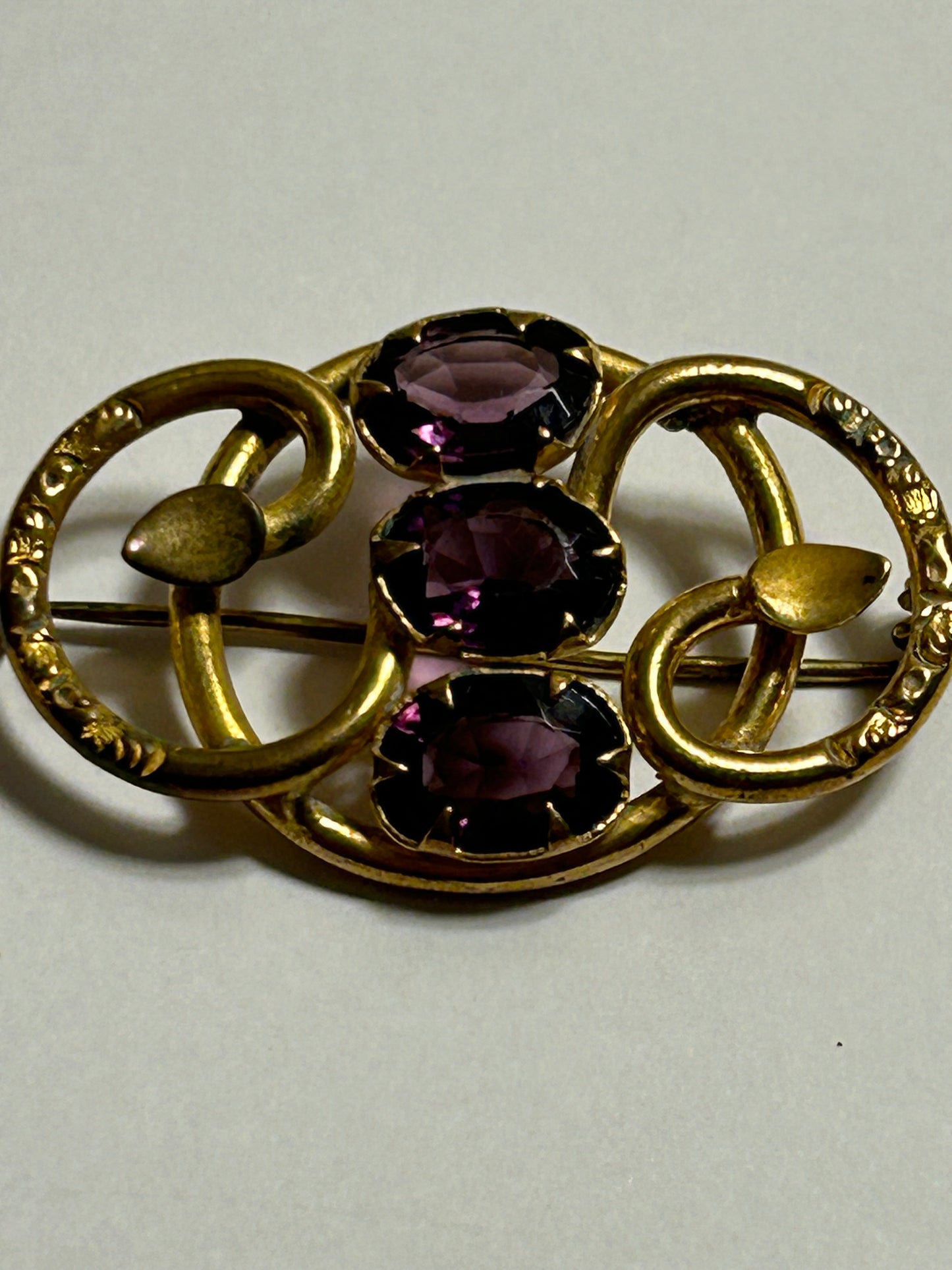 Antique Victorian purple stone brooch love knot