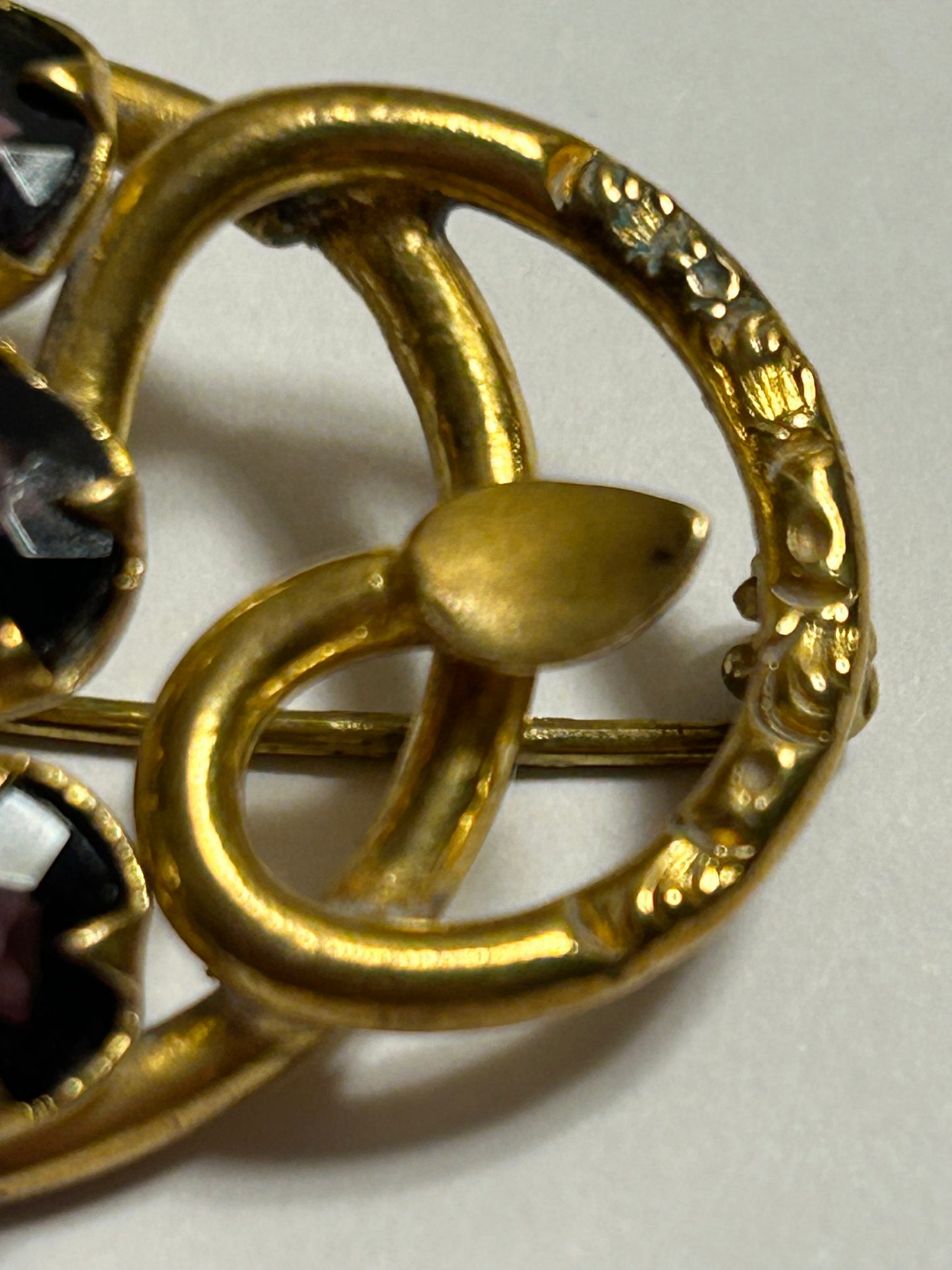 Antique Victorian purple stone brooch love knot