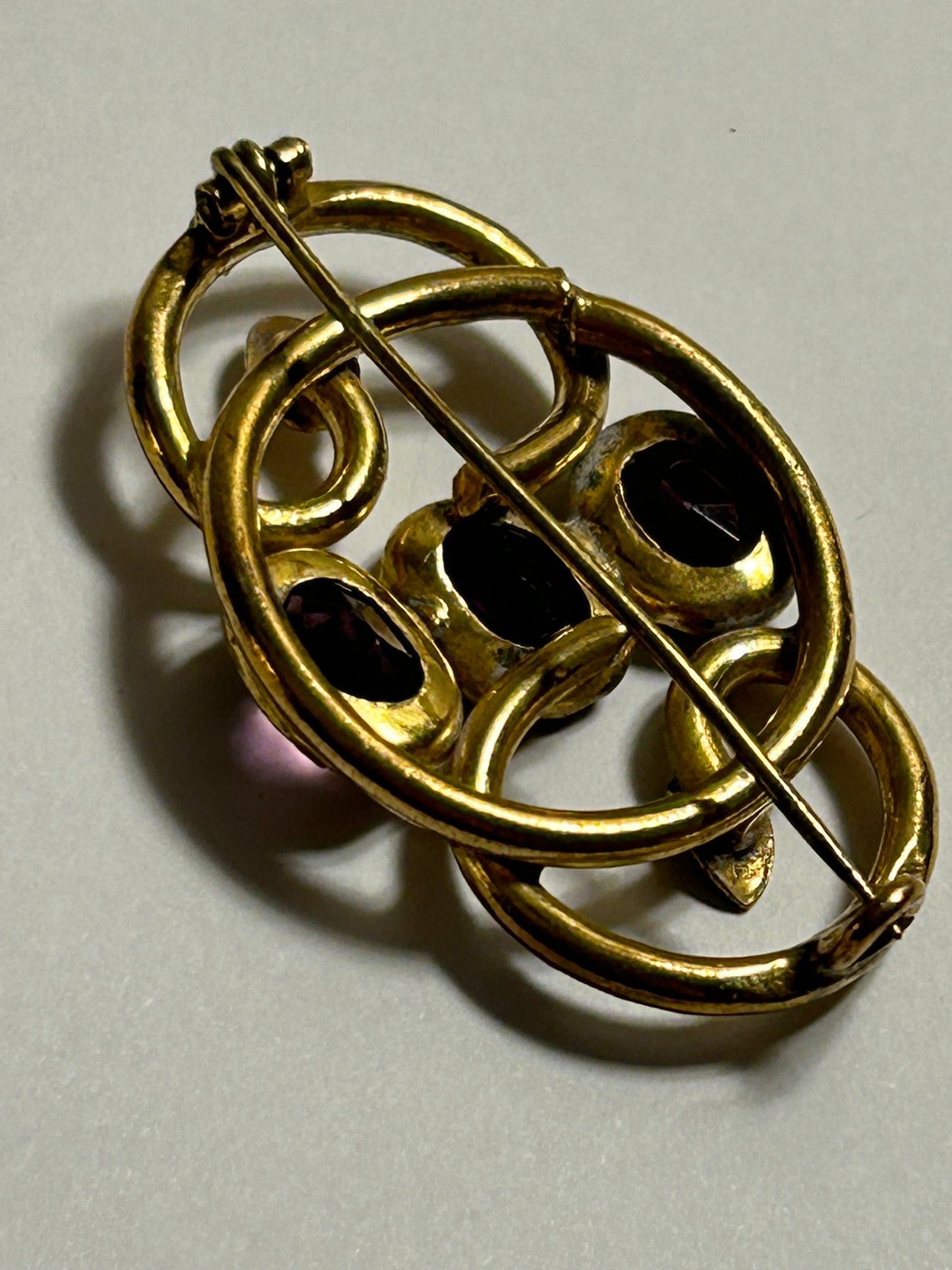 Antique Victorian purple stone brooch love knot
