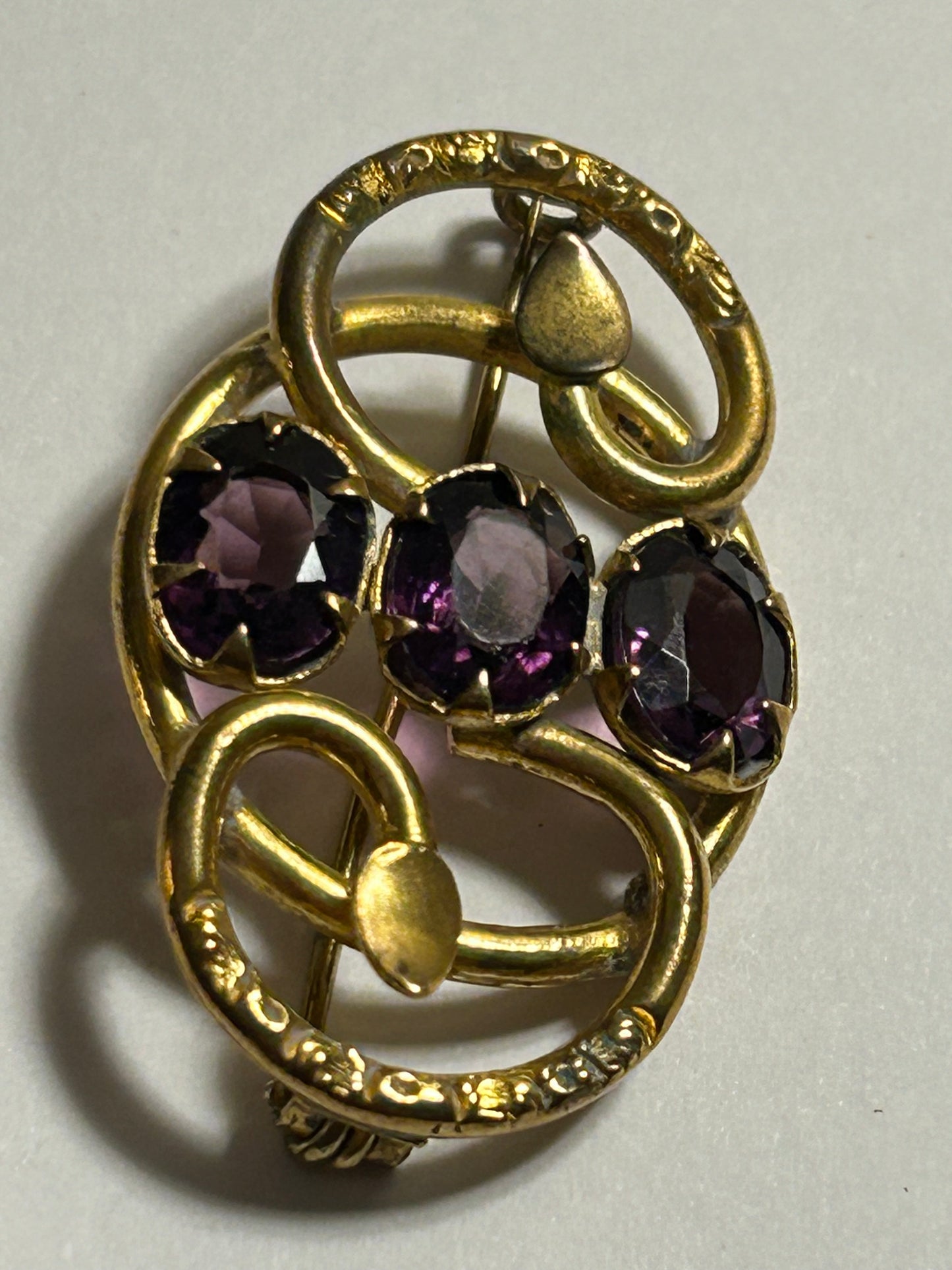 Antique Victorian purple stone brooch love knot