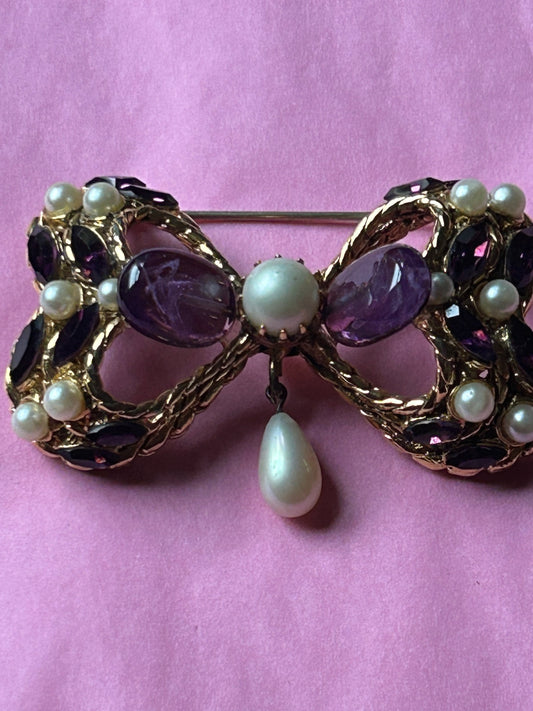 Pretty Vintage Brooch Signed Adrian Mann Bow with Amethyst Stones.