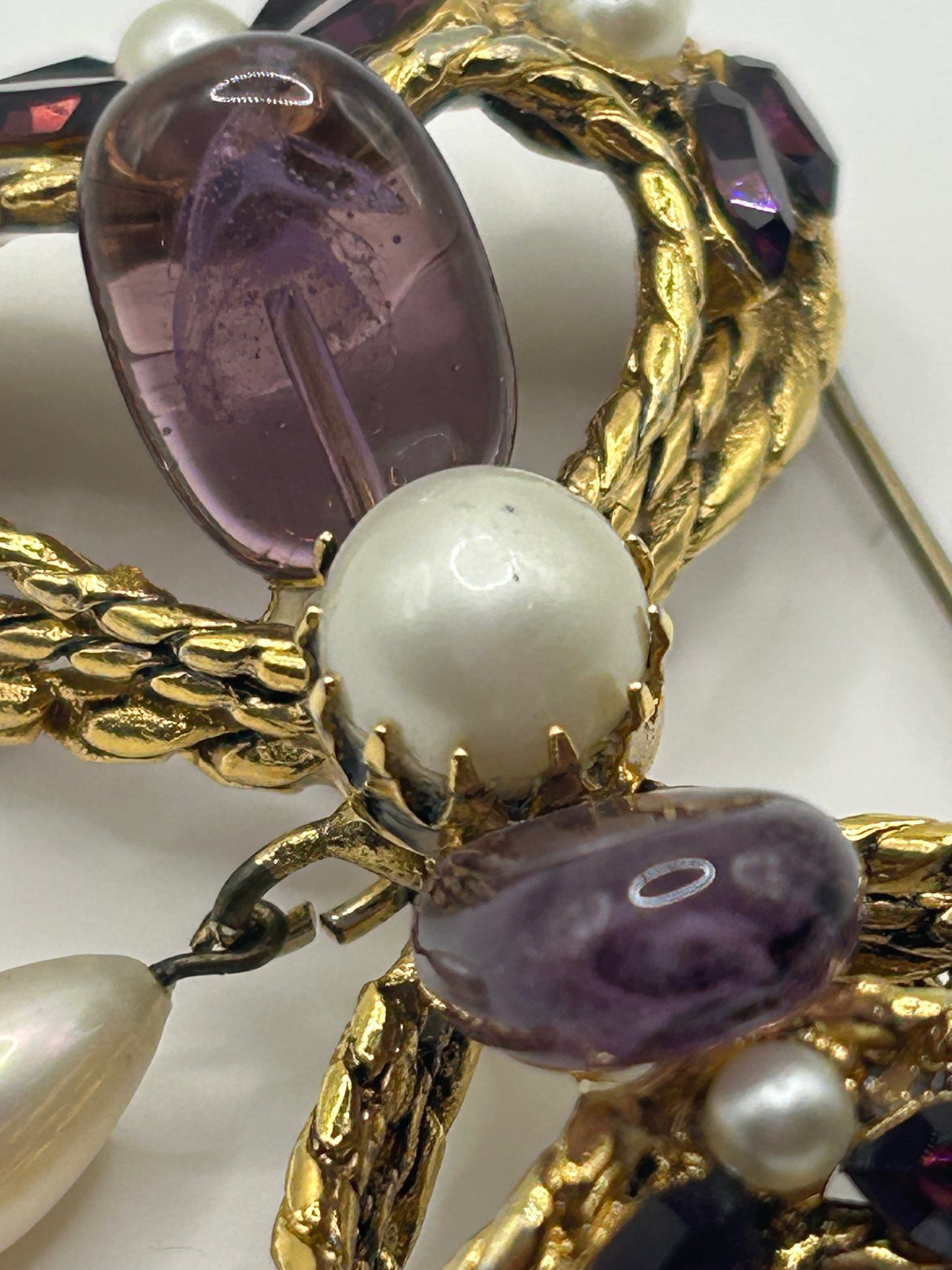 Pretty Vintage Brooch Signed Adrian Mann Bow with Amethyst Stones.