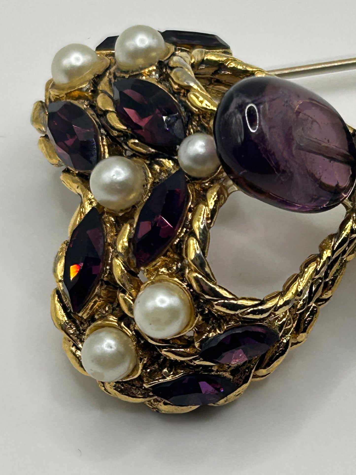 Pretty Vintage Brooch Signed Adrian Mann Bow with Amethyst Stones.