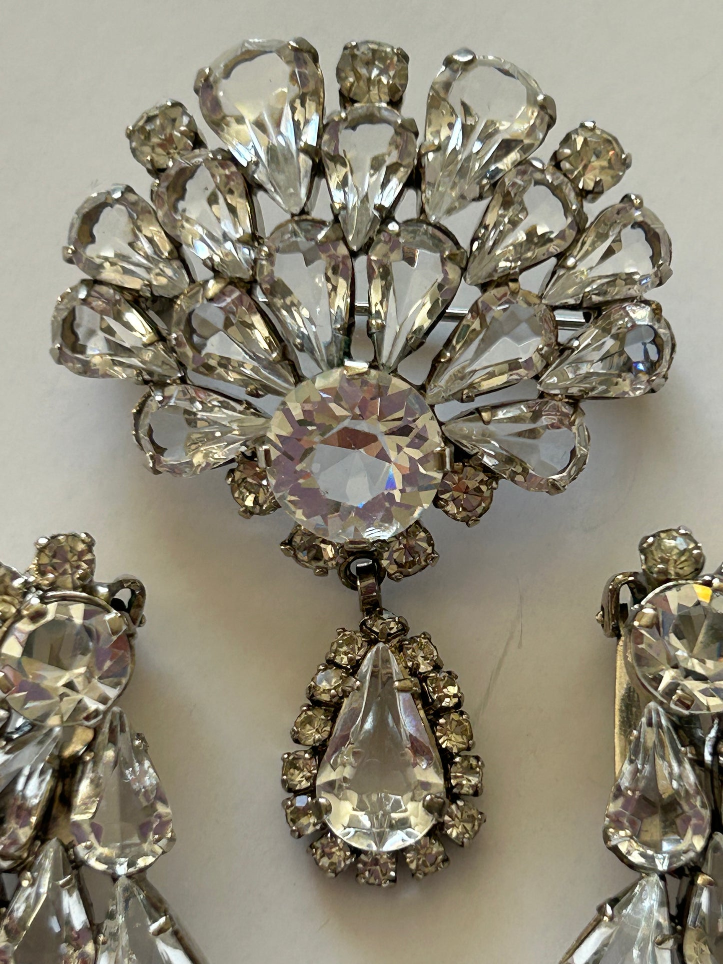 Vintage crystal set brooch and clip on earrings.