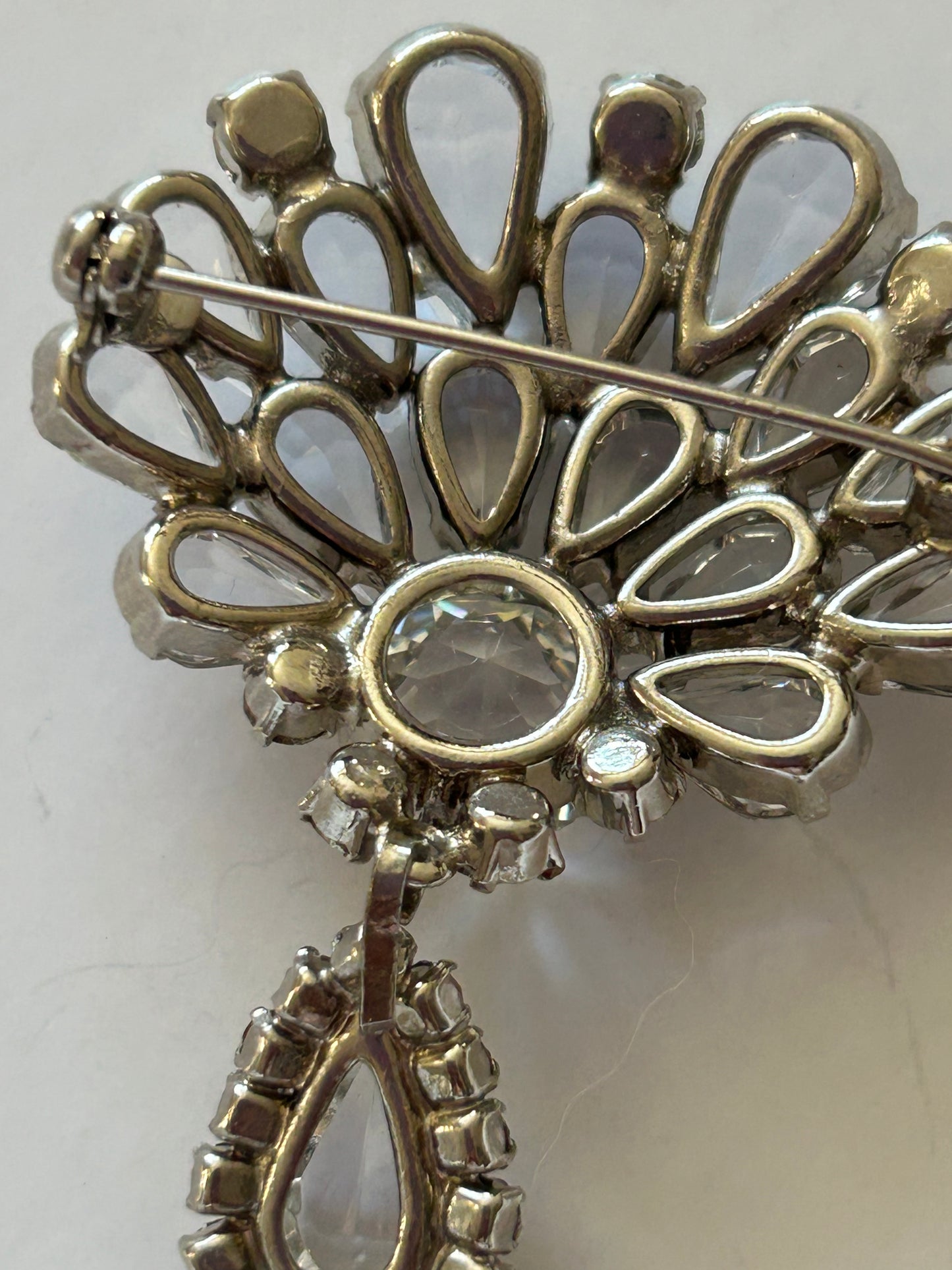 Vintage crystal set brooch and clip on earrings.